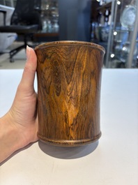 Two Chinese hardwooden brush pots, 20th C.