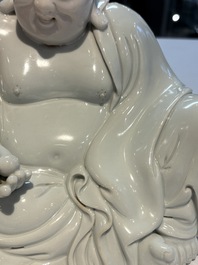 A fine Chinese white-glazed Milefo Buddha, 19th C.