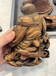 Six Chinese wooden and bamboo carvings, 19/20th C.