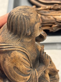 Six Chinese wooden and bamboo carvings, 19/20th C.
