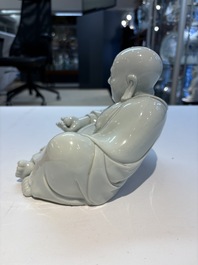 A fine Chinese white-glazed Milefo Buddha, 19th C.