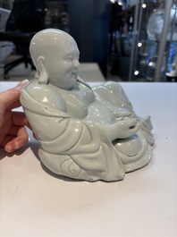 A fine Chinese white-glazed Milefo Buddha, 19th C.