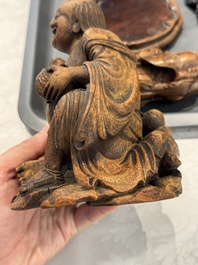 Six Chinese wooden and bamboo carvings, 19/20th C.