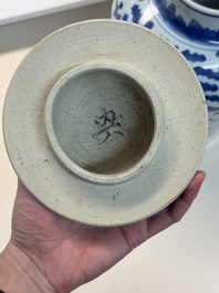 A Chinese blue and white vase and cover with floral design, Kangxi