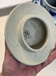 A Chinese blue and white vase and cover with floral design, Kangxi