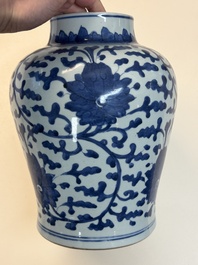A Chinese blue and white vase and cover with floral design, Kangxi