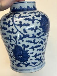 A Chinese blue and white vase and cover with floral design, Kangxi