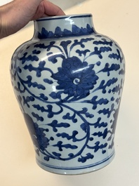 A Chinese blue and white vase and cover with floral design, Kangxi