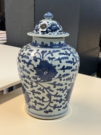A Chinese blue and white vase and cover with floral design, Kangxi