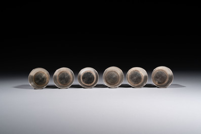 A Chinese Canton or Vietnamese silver bottle vase with landscape design and six cups, 19th C.