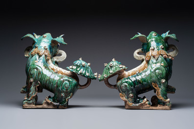 A pair of large Chinese polychrome-glazed Shiwan stoneware Buddhist lions, 19th C.