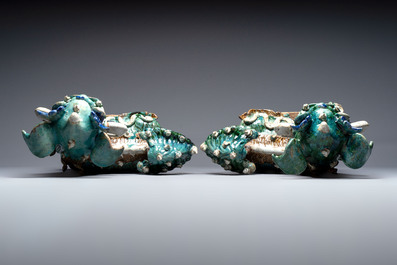 A pair of large Chinese polychrome-glazed Shiwan stoneware Buddhist lions, 19th C.
