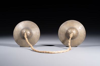 A varied collection of seven Tibetan ritual utensils, including a turquoise-inlaid silver relic holder, 19/20th C.
