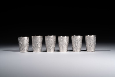 A Chinese Canton or Vietnamese silver bottle vase with landscape design and six cups, 19th C.