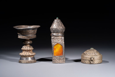A varied collection of seven Tibetan ritual utensils, including a turquoise-inlaid silver relic holder, 19/20th C.