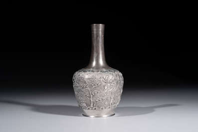 A Chinese Canton or Vietnamese silver bottle vase with landscape design and six cups, 19th C.