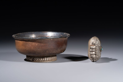 A varied collection of seven Tibetan ritual utensils, including a turquoise-inlaid silver relic holder, 19/20th C.