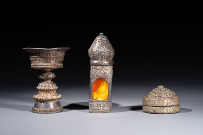 A varied collection of seven Tibetan ritual utensils, including a turquoise-inlaid silver relic holder, 19/20th C.