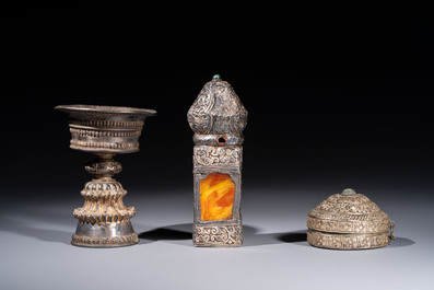 A varied collection of seven Tibetan ritual utensils, including a turquoise-inlaid silver relic holder, 19/20th C.