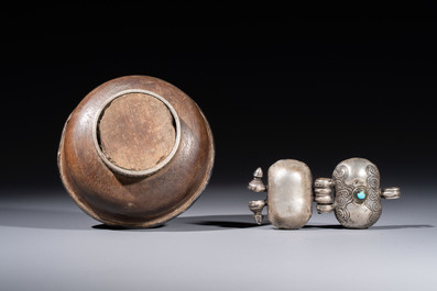 A varied collection of seven Tibetan ritual utensils, including a turquoise-inlaid silver relic holder, 19/20th C.