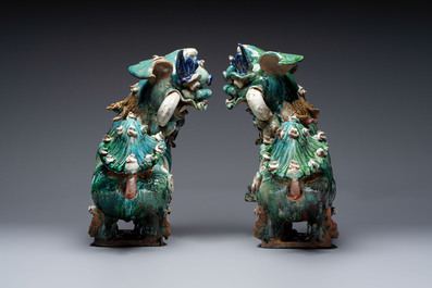 A pair of large Chinese polychrome-glazed Shiwan stoneware Buddhist lions, 19th C.
