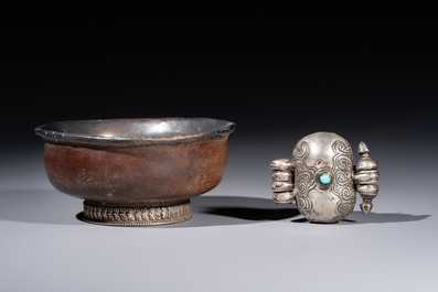 A varied collection of seven Tibetan ritual utensils, including a turquoise-inlaid silver relic holder, 19/20th C.