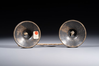 A varied collection of seven Tibetan ritual utensils, including a turquoise-inlaid silver relic holder, 19/20th C.