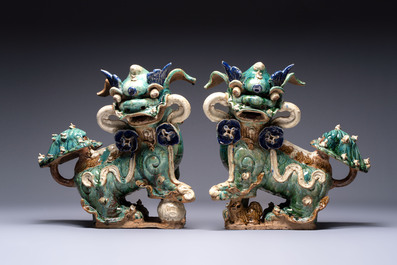 A pair of large Chinese polychrome-glazed Shiwan stoneware Buddhist lions, 19th C.