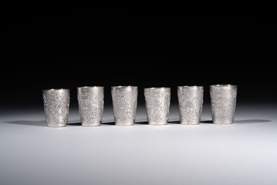 A Chinese Canton or Vietnamese silver bottle vase with landscape design and six cups, 19th C.