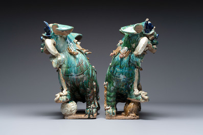 A pair of large Chinese polychrome-glazed Shiwan stoneware Buddhist lions, 19th C.