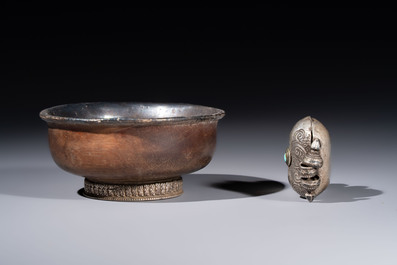 A varied collection of seven Tibetan ritual utensils, including a turquoise-inlaid silver relic holder, 19/20th C.