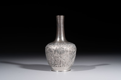 A Chinese Canton or Vietnamese silver bottle vase with landscape design and six cups, 19th C.