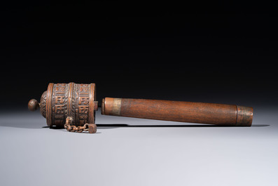 A varied collection of seven Tibetan ritual utensils, including a turquoise-inlaid silver relic holder, 19/20th C.