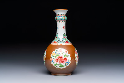 A Chinese famille rose capucine-ground vase with floral design, Yongzheng/Qianlong