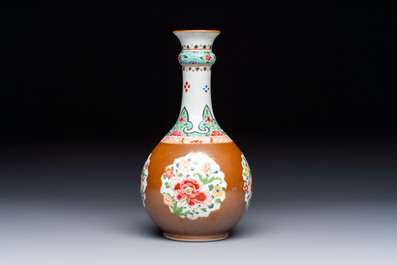 A Chinese famille rose capucine-ground vase with floral design, Yongzheng/Qianlong