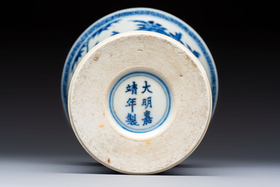 A Chinese blue and white 'Gu' vase with birds among flowering branches, Jiajing mark, 19th C.