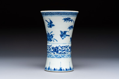 A Chinese blue and white 'Gu' vase with birds among flowering branches, Jiajing mark, 19th C.