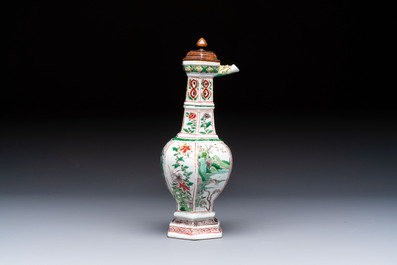A rare Chinese famille verte puzzle jug with a wooden cover, Kangxi
