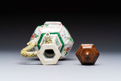A rare Chinese famille verte puzzle jug with a wooden cover, Kangxi