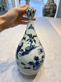 A rare Chinese blue and white 'Immortals' garlic-mouth bottle vase, Wanli/Tianqi