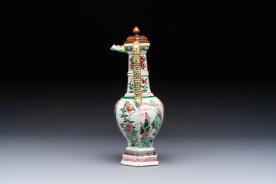 A rare Chinese famille verte puzzle jug with a wooden cover, Kangxi