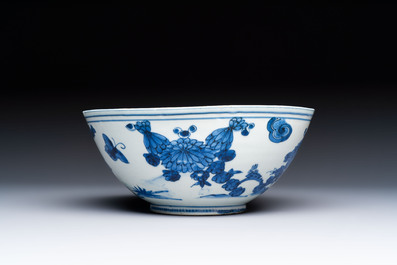 A Chinese blue and white 'Butterflies and Flowers' bowl, Transitional period