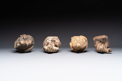 Eight Chinese carved wooden sculptures with traces of polychromy and gilding, 19th C.