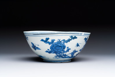 A Chinese blue and white 'Butterflies and Flowers' bowl, Transitional period