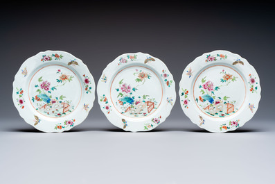 Eight Chinese famille rose plates with floral design and a 'Rooster' teapot, Yongzheng/Qianlong