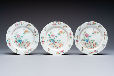 Eight Chinese famille rose plates with floral design and a 'Rooster' teapot, Yongzheng/Qianlong