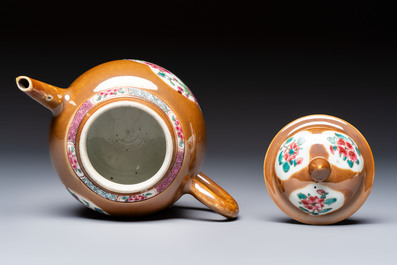 A Chinese famille rose capucine-ground covered teapot with floral design, seven cups and saucers, Yongzheng/Qianlong