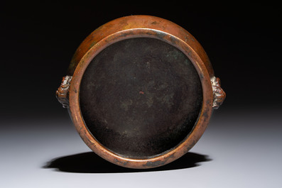 A Chinese bronze censer with lion-head handles and relief dragon design, Lu Gu Zhai 侶古齋 mark, 18/19th C.