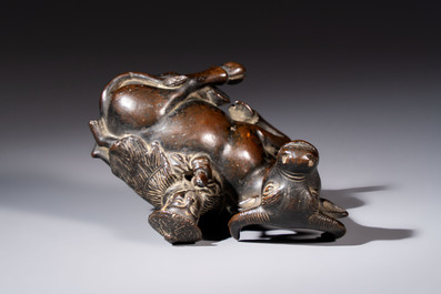 A Chinese bronze 'Boy and Buffalo' paperweight, Ming