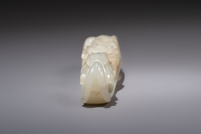A fine Chinese white jade 'Dragon' belt hook, Qing